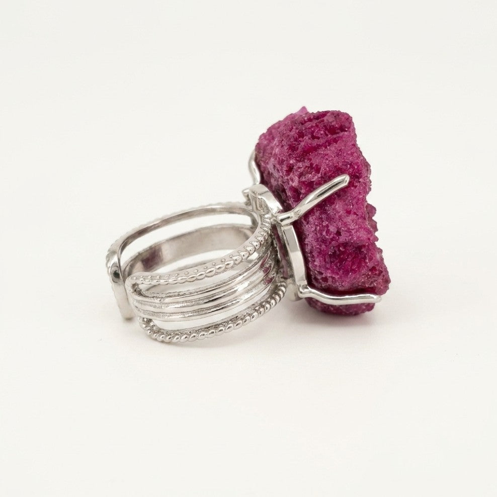 Wild Orchid ring in magenta, shown from the rear with its visible ring silhouette.