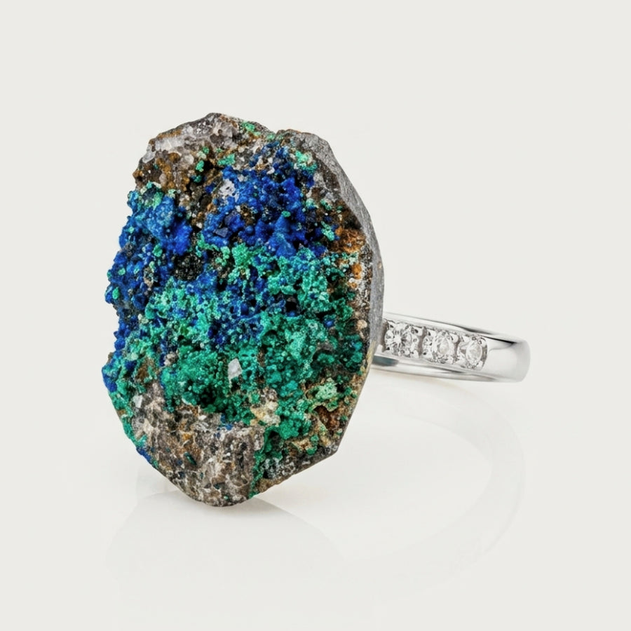 Front view of Forest Vessel, a sculptural ring with blue-green contrast.