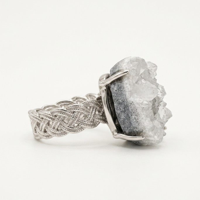 Rear three-quarter view of Cloud Crown, showing its raised setting and woven silver-toned band.