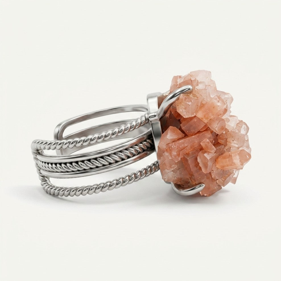 Dawn Cluster ring in warm tones, shown from the rear with its visible ring silhouette.