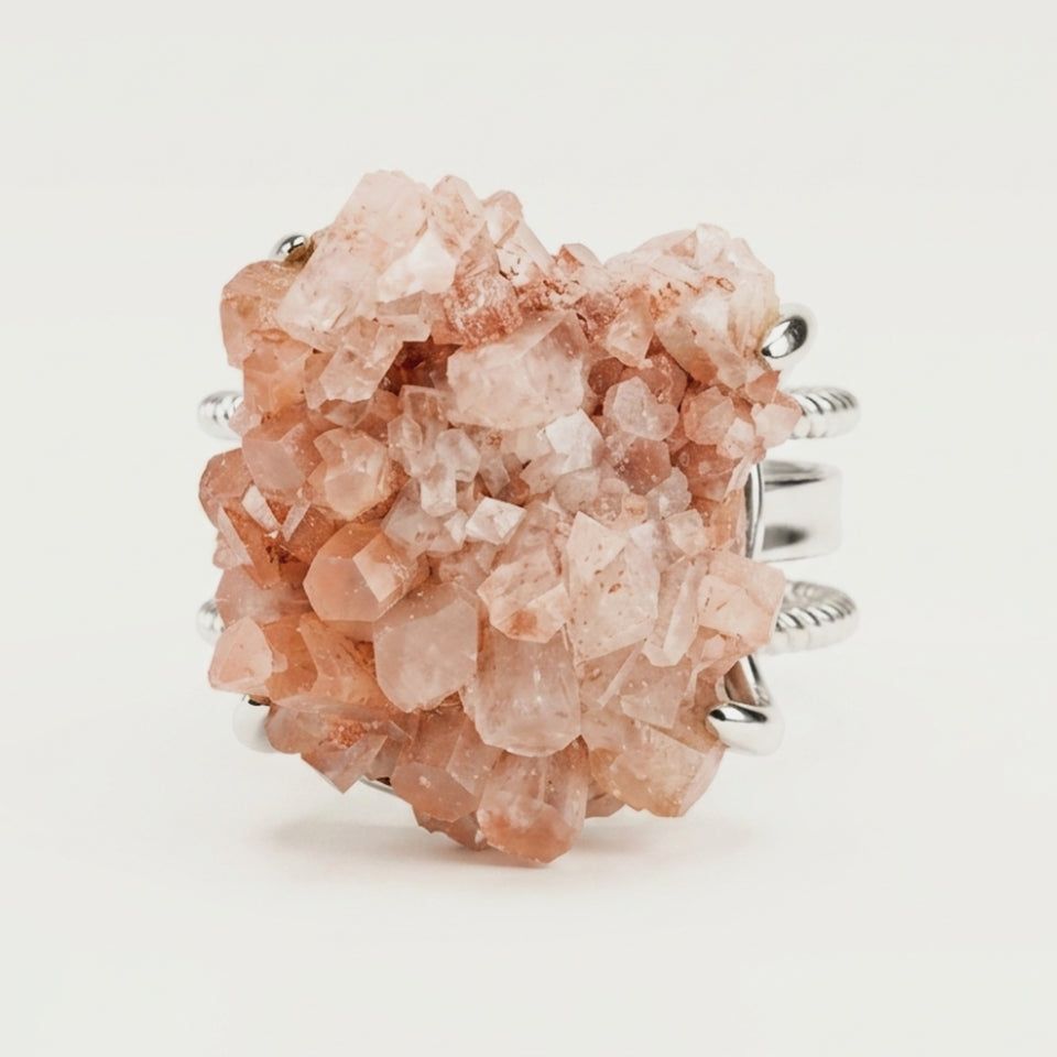 Front view of Dawn Cluster, a sculptural ring with warm-toned variation.