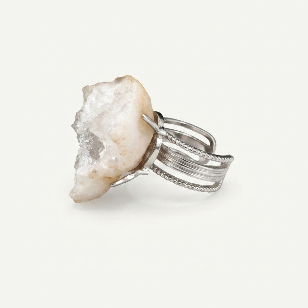 White Terrain ring in white tones, shown at a three-quarter angle.