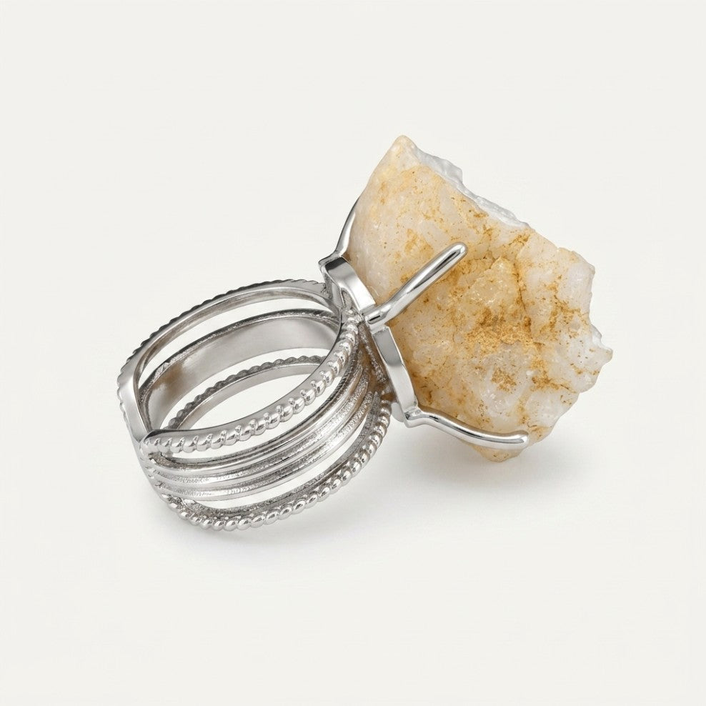 White Terrain ring in white tones, shown from the rear with its visible ring silhouette.