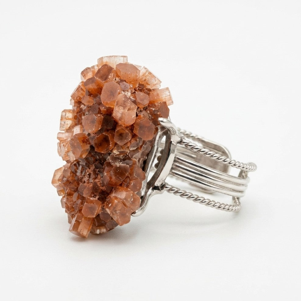 Terracotta Bloom ring in earth and rose tones, shown from the front.