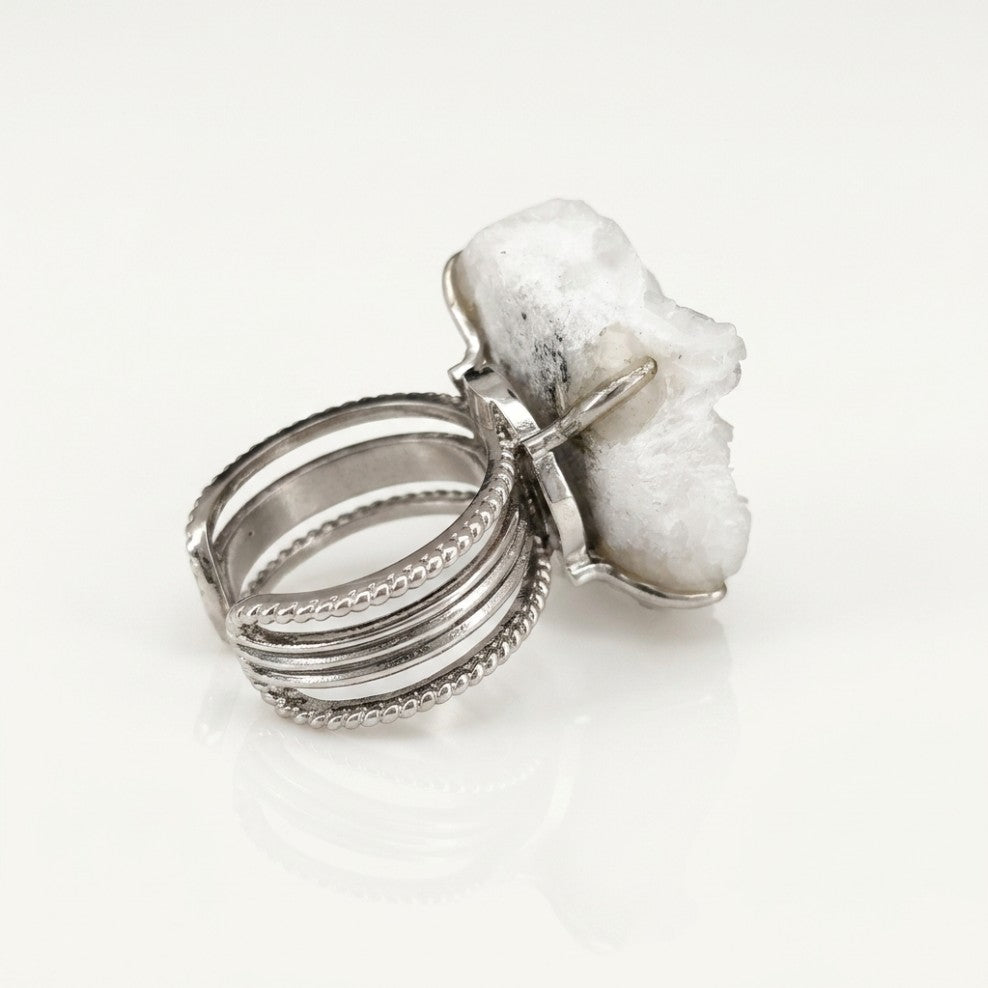 Pale Monolith ring in pale tones, shown at a three-quarter angle.