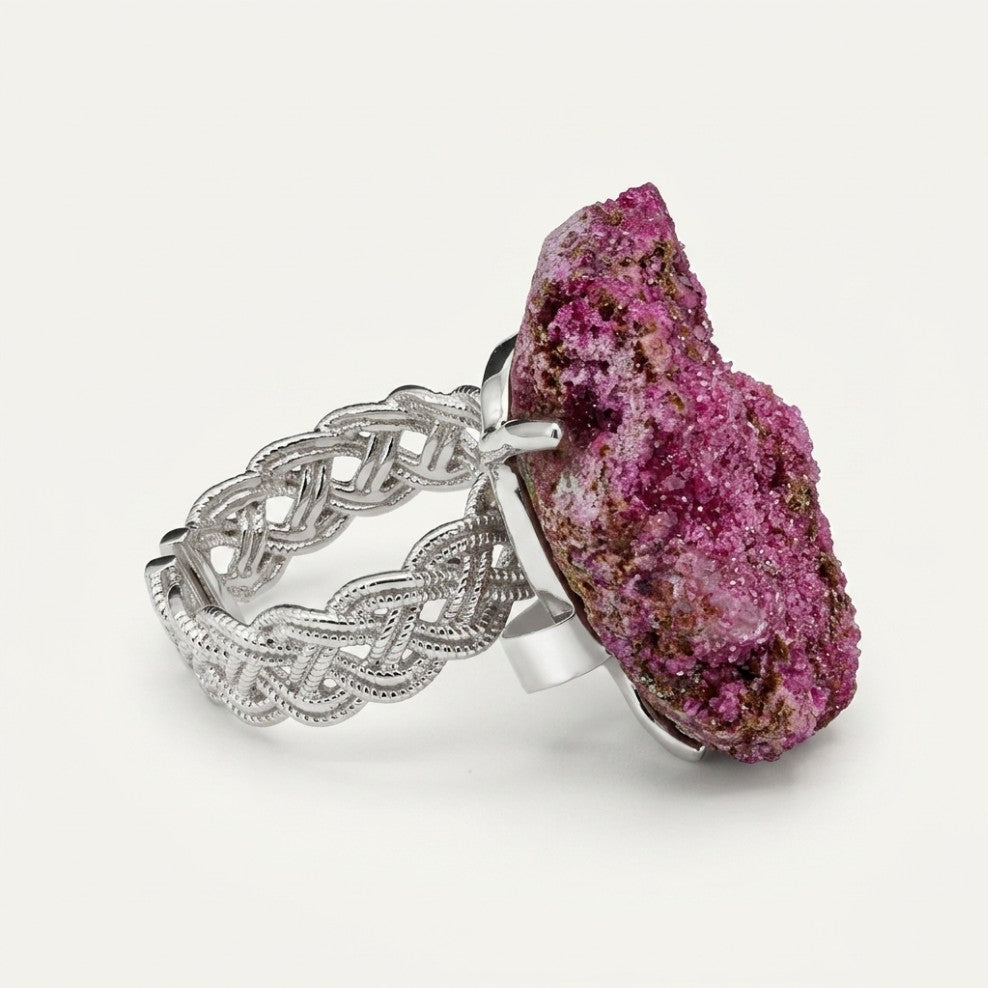Violet Vessel ring in violet tones, shown at a three-quarter angle.