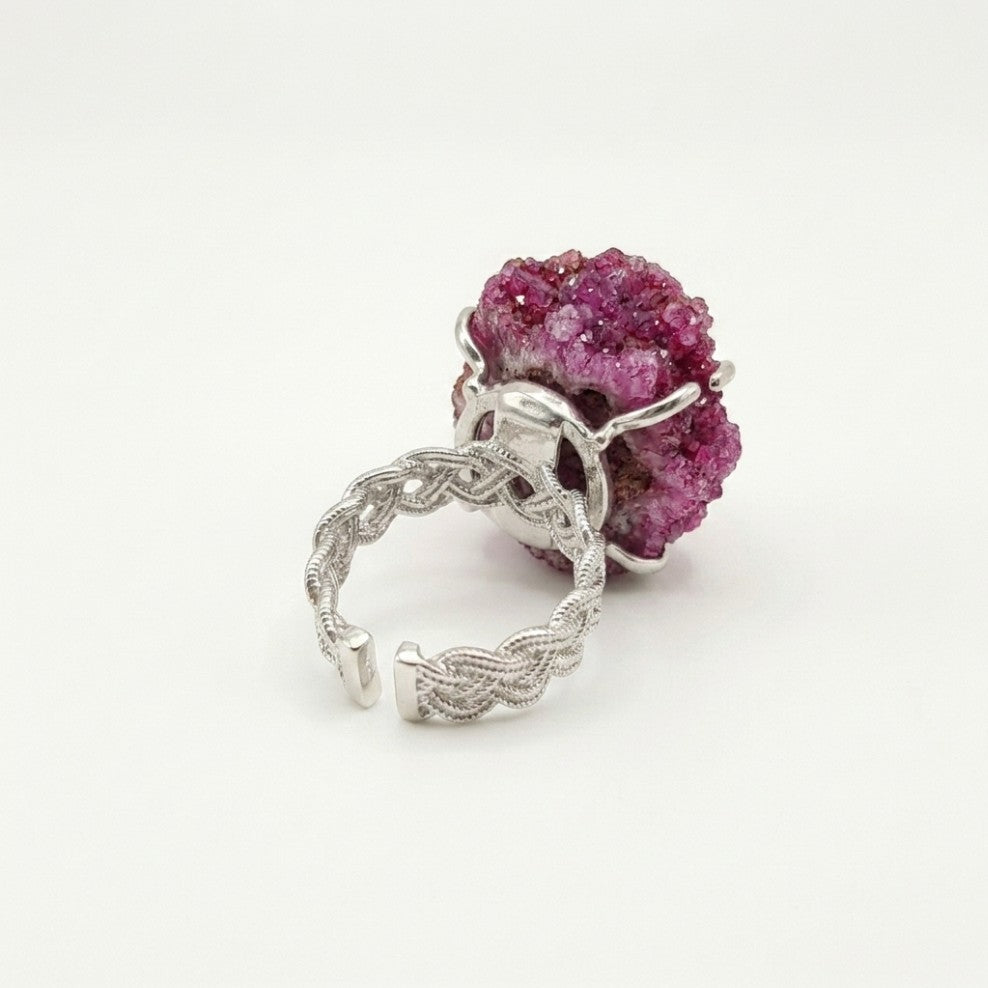 Violet Vessel ring in violet tones, shown from the rear with its visible ring silhouette.