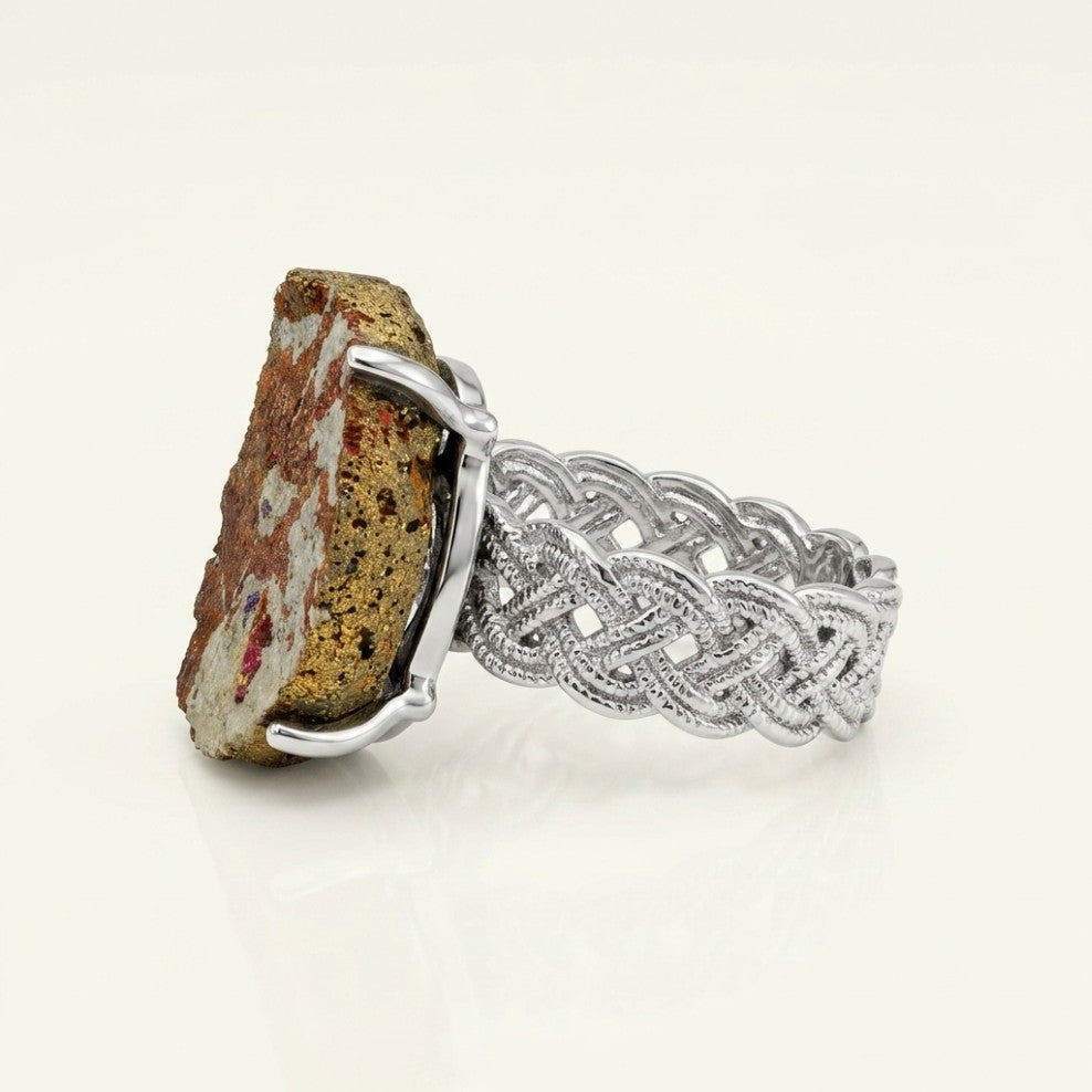 Earthscript ring in earth tones, shown from the rear with its visible ring silhouette.