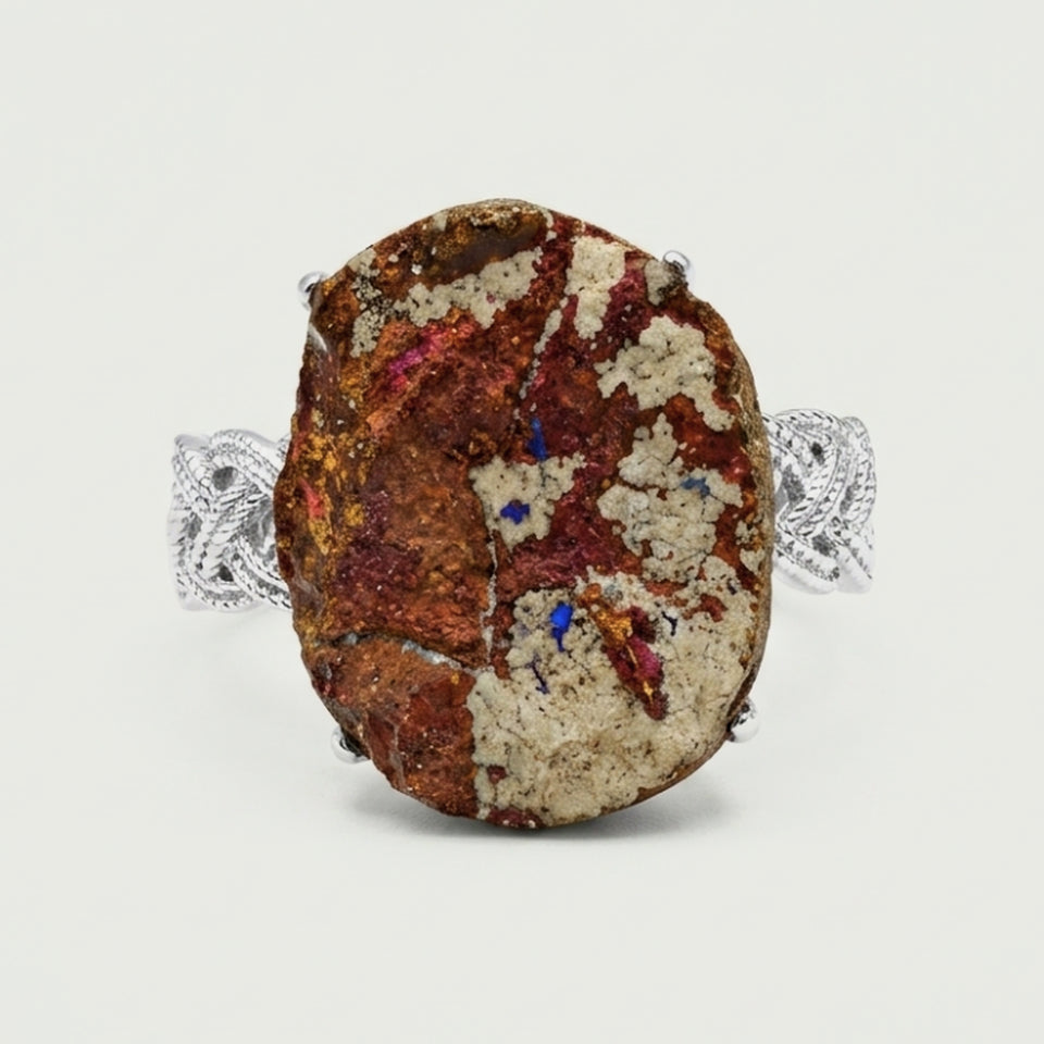 Front view of Earthscript, a sculptural ring with earth-toned variation.