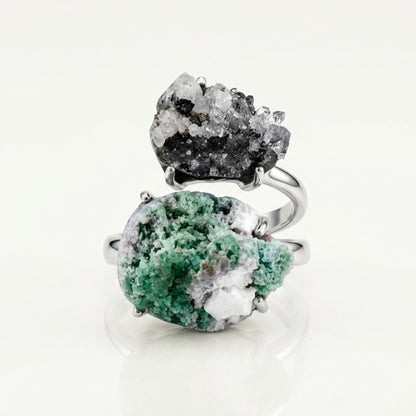 Verdant Bridge ring in green and silver tones, shown at a three-quarter angle.