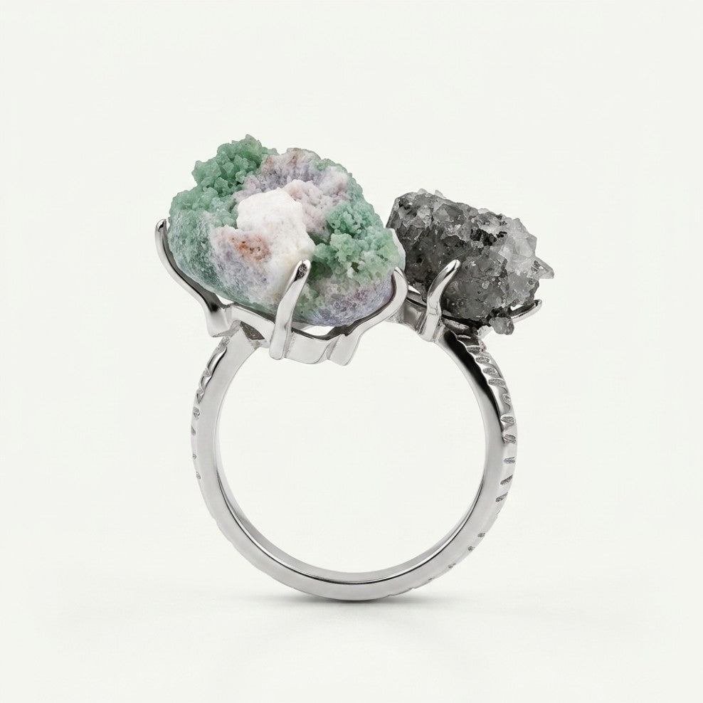 Verdant Bridge ring in green and silver tones, shown from the side.