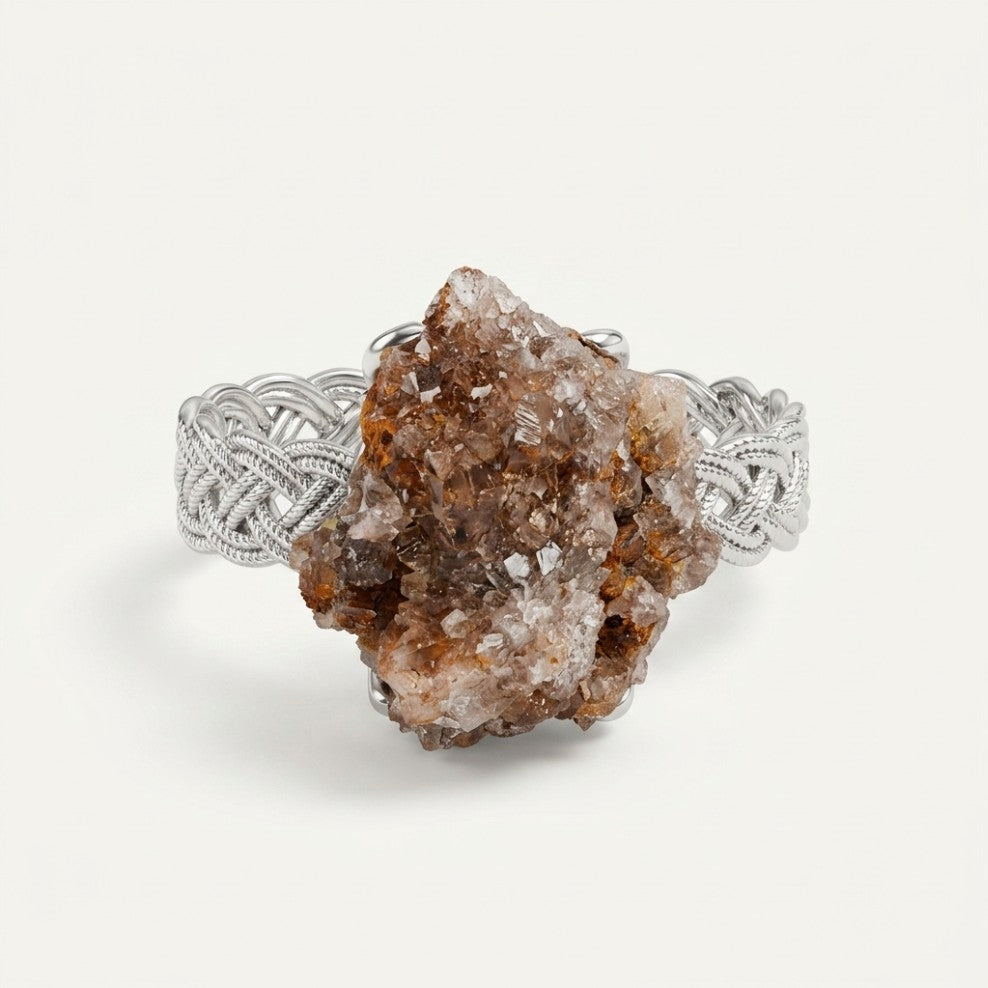 Rooted Chain ring in earth tones, shown at a three-quarter angle.